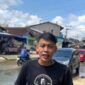 Syahril Saili salah satu pemuda yang berada di Kelurahan Sungai Pinang Dalam saat berada di lokasi genangan