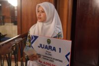 Juara 1 kategori vidio vlog saat diwawancarai.