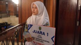 Juara 1 kategori vidio vlog saat diwawancarai.