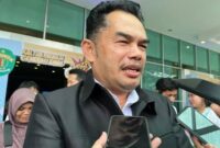 Ketua DPRD Kaltim, Hasanuddin Mas'ud saat menghadiri pelaksanaan launching Program Gratispol di Plenary Hall GOR Kadrie Oening Sempaja Samarinda. (Foto : Humas DPRD Kaltim)