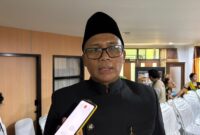 Foto: Sekda Kukar, Sunggono saat Tanggapan Fraksi di Sidang Paripurna DPRD Kukar.