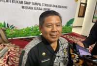 Foto: Plt Kepala Disdukcapil Kukar, Muhamad Iryanto.