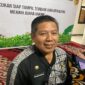 Foto: Plt Kepala Disdukcapil Kukar, Muhamad Iryanto.