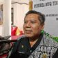 Foto: Plt Kepala Disdukcapil Kukar, Muhamad Iryanto.